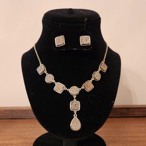 Lovely gold tone drop pave necklace and earring set